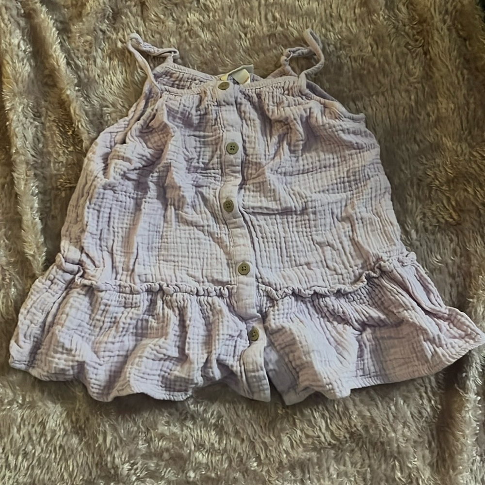 This is a very cute large (10/12) girls light purple tank top.